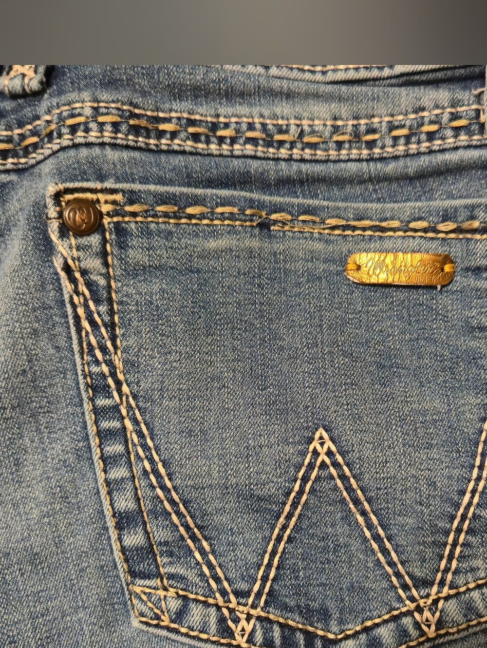 Wrangler Blue Denim Jeans with Gold Logo Plate